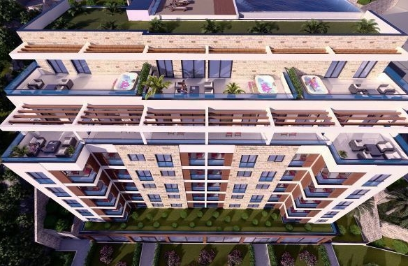 Trosoban stan 113m2 u novom luksuznom stambenom kompleksu u izgradnji u Bečićima, bez poreza, 200 metara od plaže, sa pogledom na more