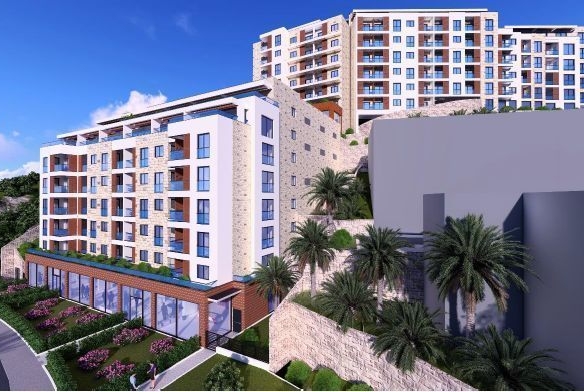 Trosoban stan 83m2 u novom luksuznom stambenom kompleksu u izgradnji u Bečićima, bez poreza, 200 metara od plaže, sa pogledom na more