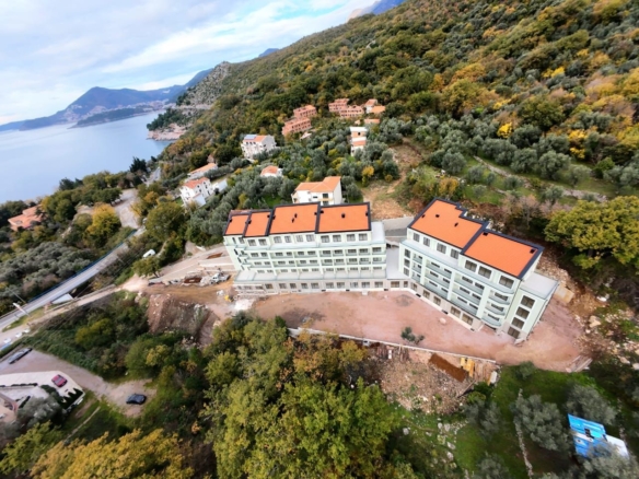 Prodaja dvosobnog stana 108m² u novogradnji sa pogledom na more,parkingom i oslobođenjem od poreza na prenos– Kamenovo, Budva