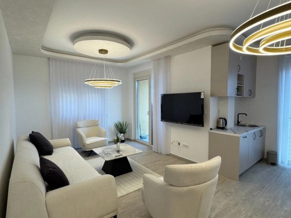 Nov luksuzno opremljen dvosoban stan sa pogledom na more i garažnim mjestom– 75 m², Bečići (IZDAVANJE NA Duži PERIOD, DOSTUPAN OD 01.09.2026)