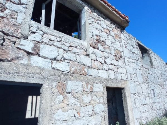 Plac sa starom kućom u Zaljevu