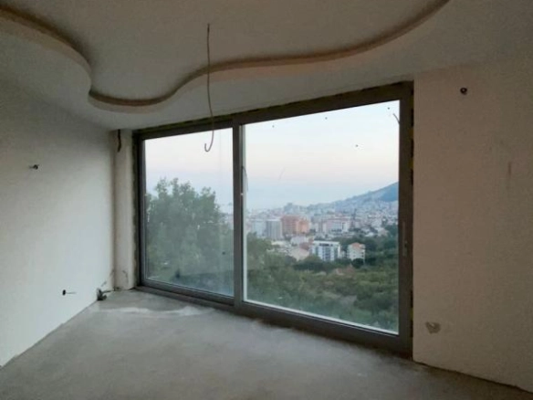 Kuća 400 m² u izgradnji sa terasom na krovu – Podmaine, Budva