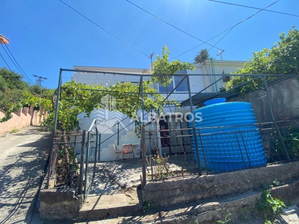 Kuća sa vrtom i garažom u Đurmanima