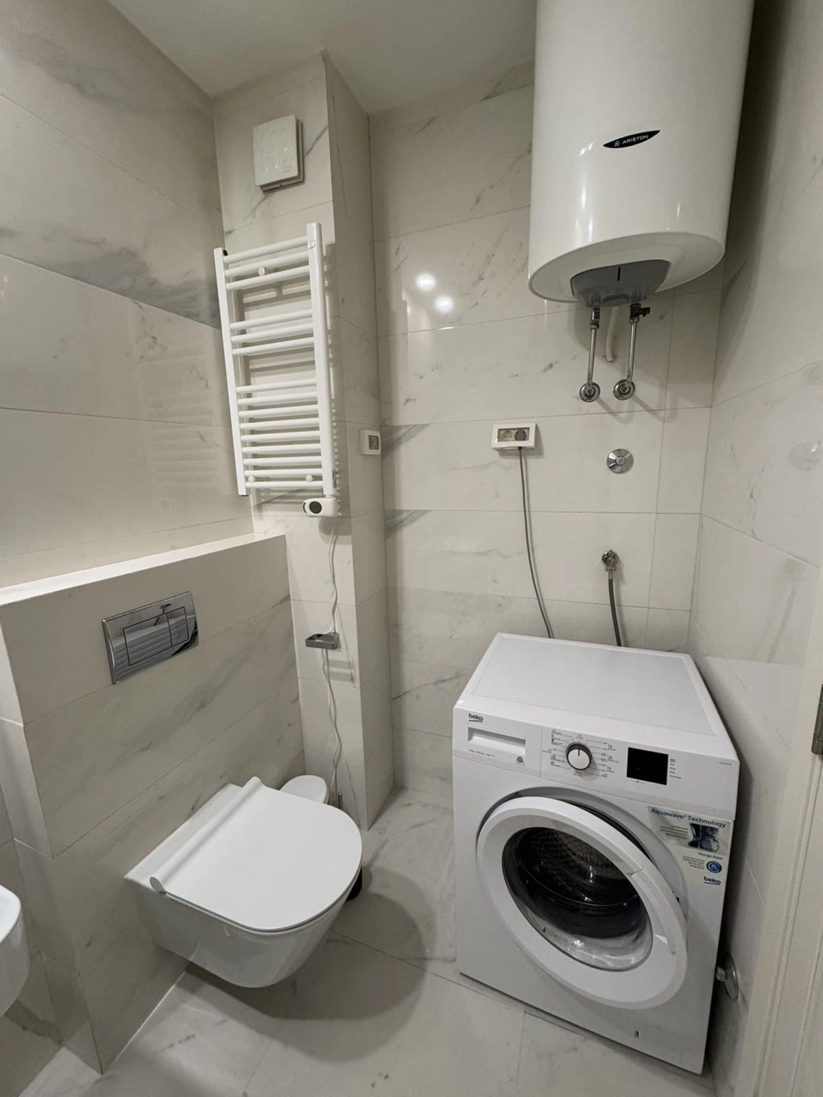 Jednosoban-stan-50-m²-u-naselju-Central-Point-Podgorica-1 Namješten jednosoban stan, Central Point, Podgorica — fotografija 2